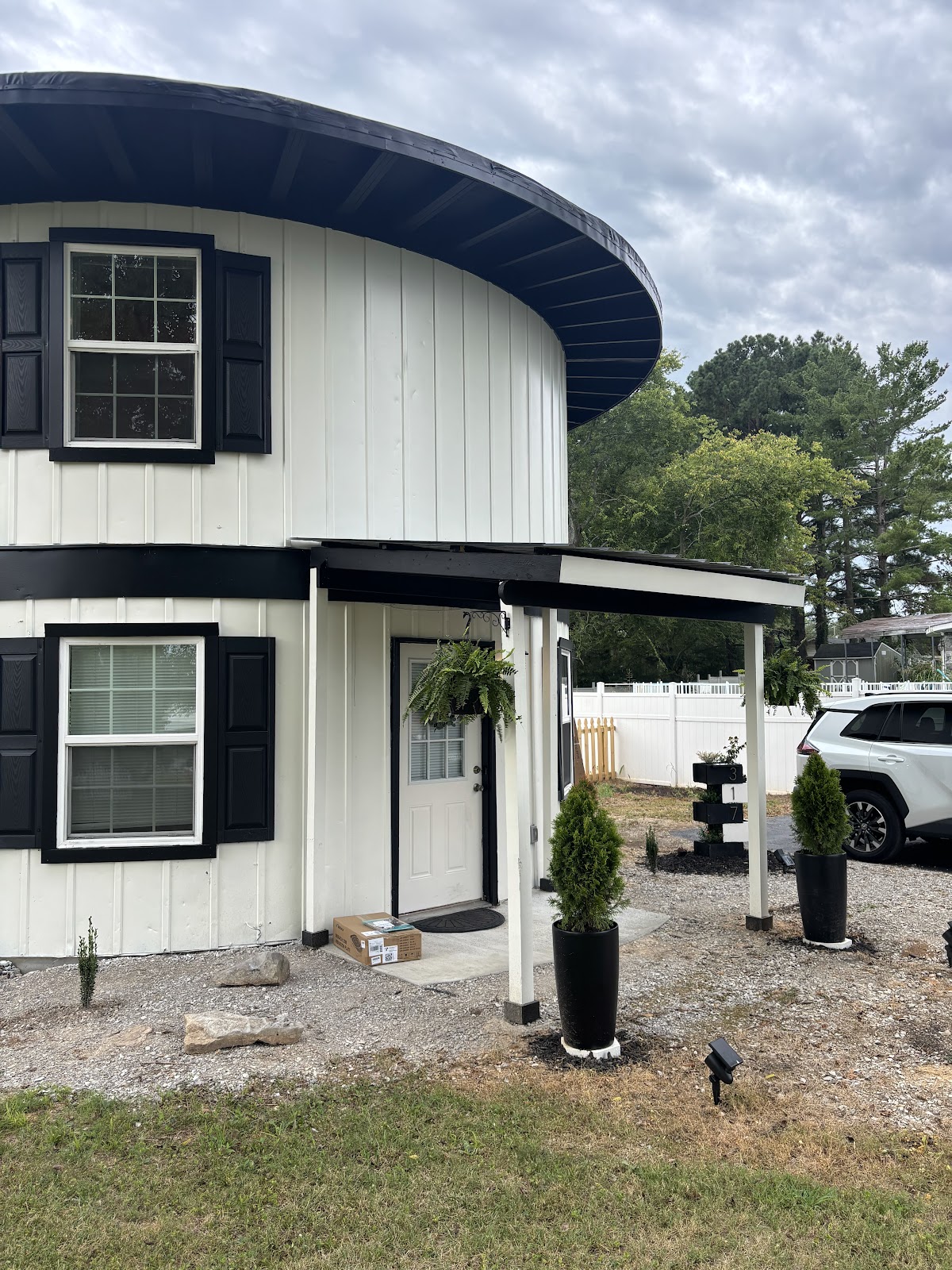 White board and batten exterior with black shutters