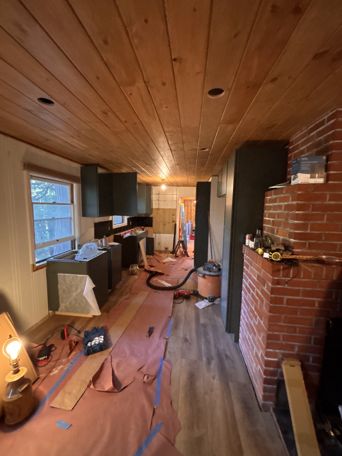 Interior remodel with tongue and groove wood ceiling